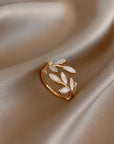 Diora | Adjustable Gold Ring With White Opal Leaf